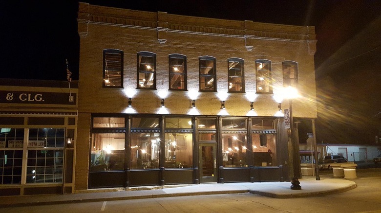 downtown festus building at night with lights