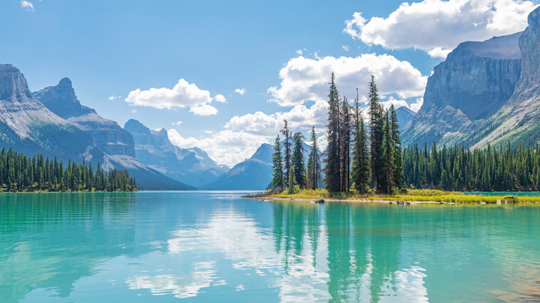 turquoise lake surrounded by mountains