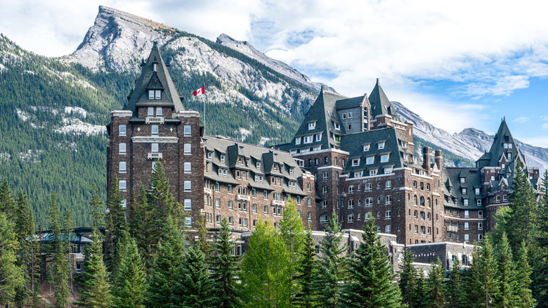 castle-like hotel surrounded by mountains