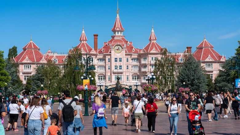 Visitors entering the main gate of Disneyland Paris