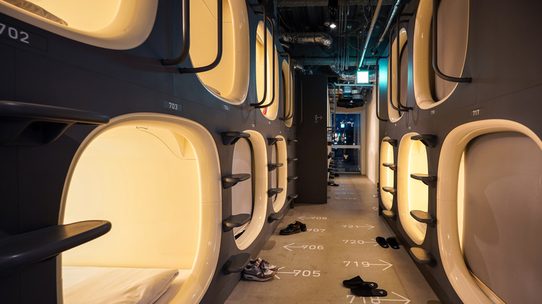 Stylish Tokyo capsule hotel pods illuminated