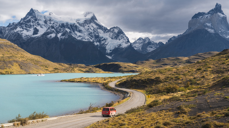 overhead shot of a car driving along in a national park