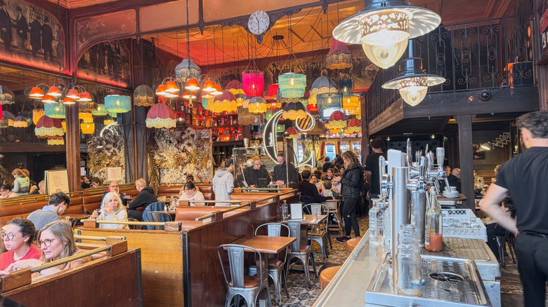 interior of a cafe in Paris , zinc counter and tables