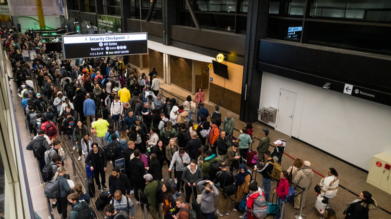 A crowded security line at the airport