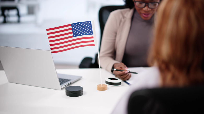 An American citizen is advised about visas