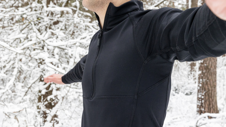 Man in base layer shirt outdoors