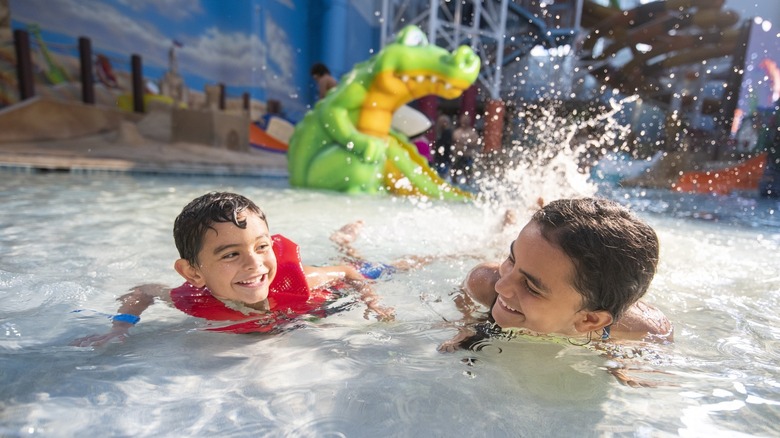Two kids swimming at the Kalahari indoor water park.