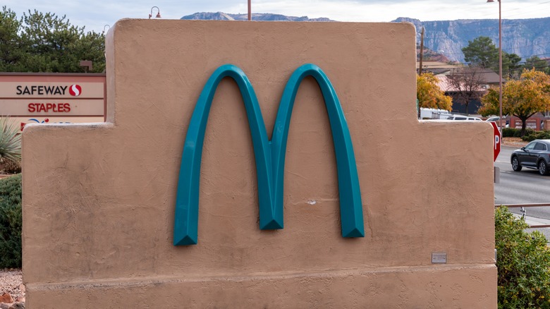 McDonald's sign with teal arches