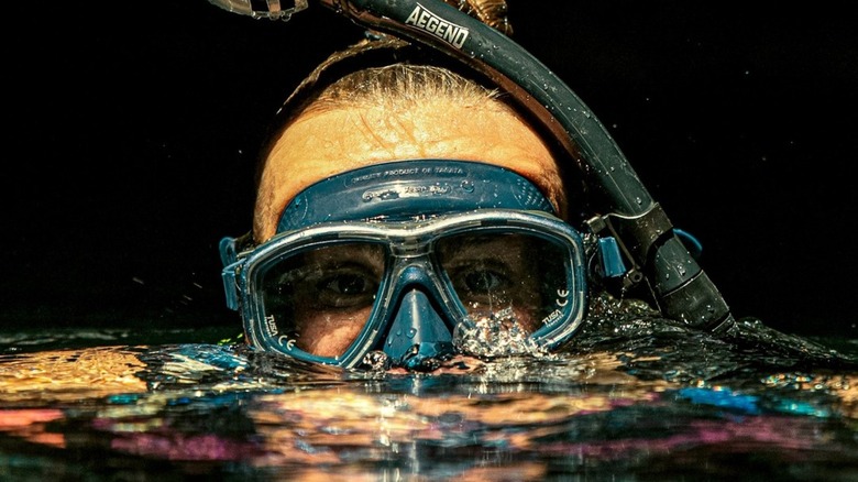 woman with snorkel gear at Homestead Crater