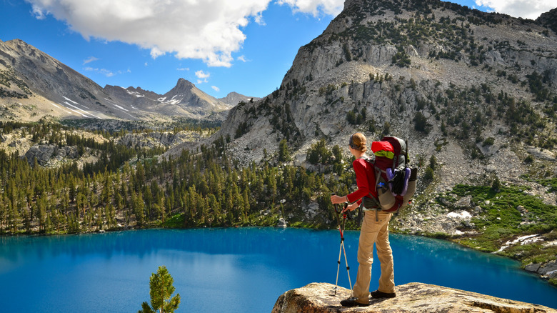 hiker looking over a lake at King's Canyon National Park