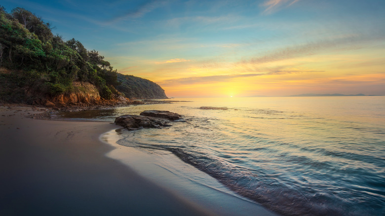 Cala Violina beach at sunset