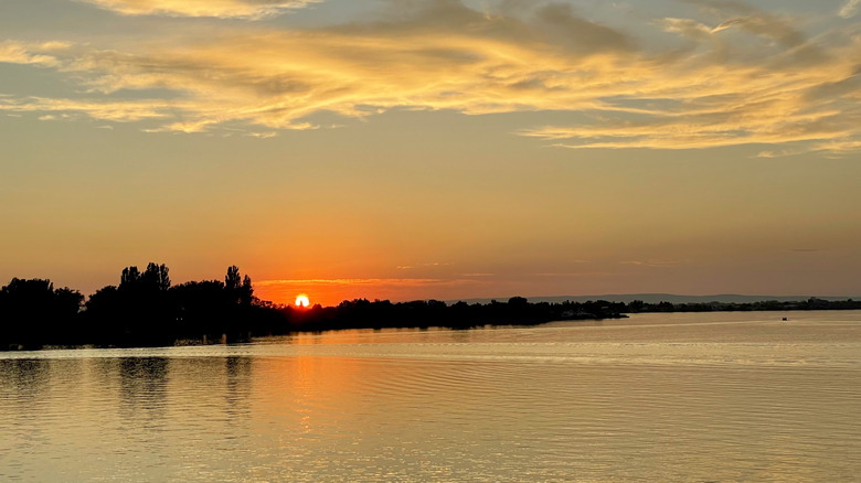 The sunset over a calm Moses Lake in Washington.