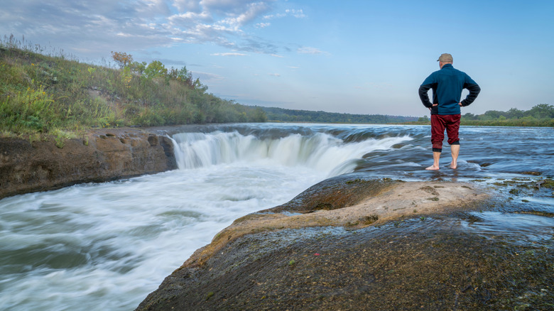 Man standing near the Niobrara National Scenic River