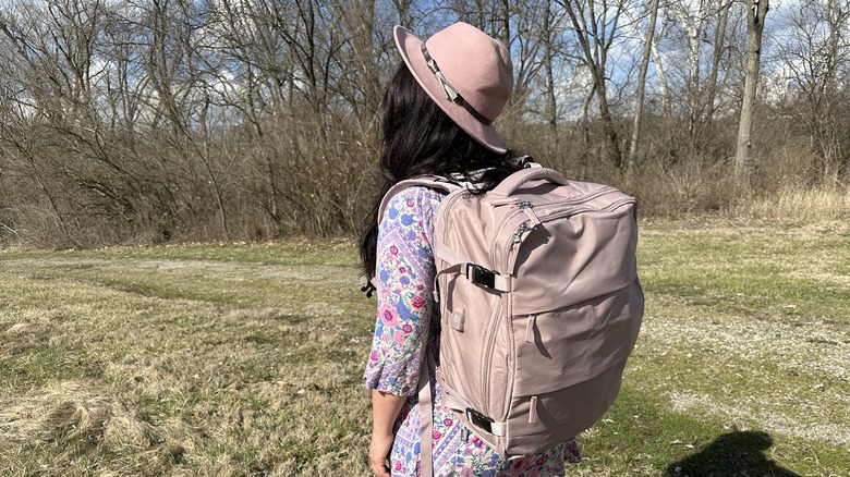 Girl with backpack outside