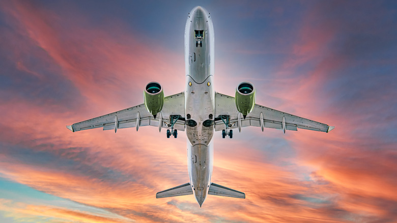 Commercial airliner under dramatic sky