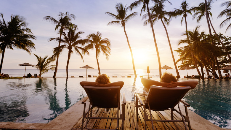 couple enjoying sunset at resort