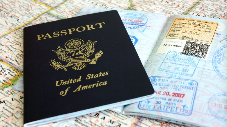 flatlay of US passport and map