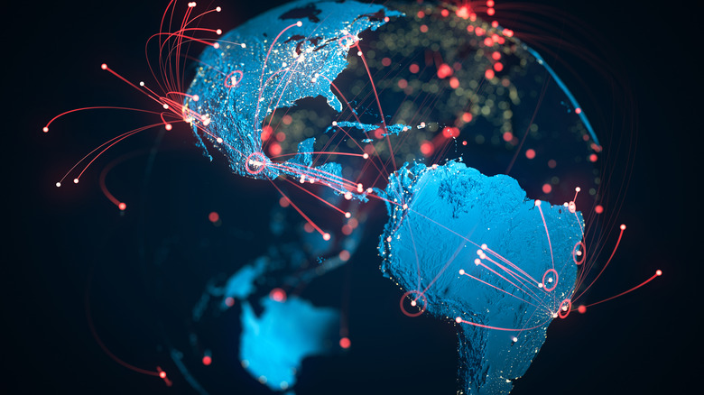 A 3D graphic showing the Earth with red lines and dots depicting international data signals