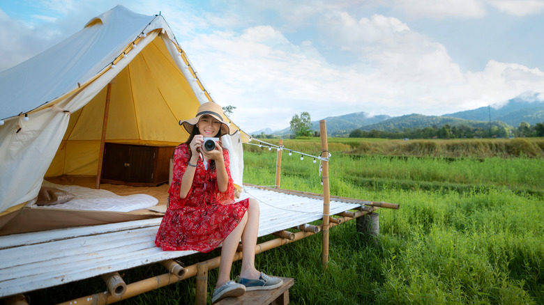 Woman in tent on farm