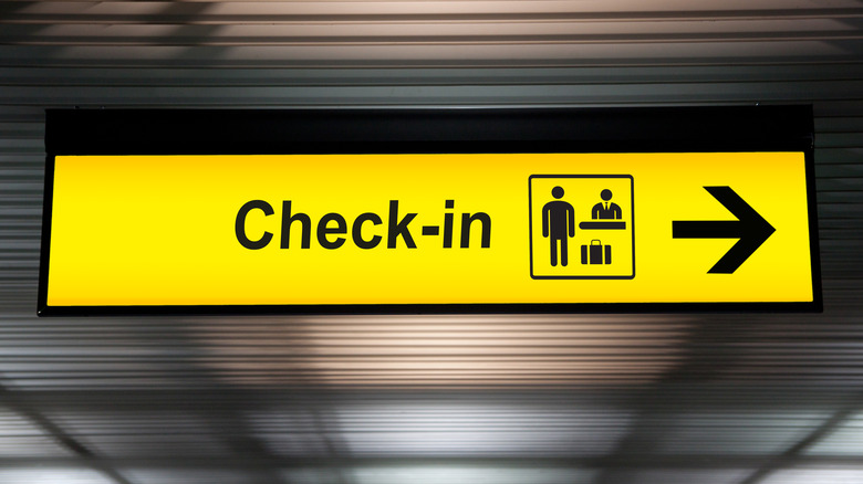 Check-in airport sign