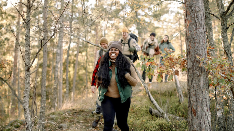 Smiling hikers on a fall hike