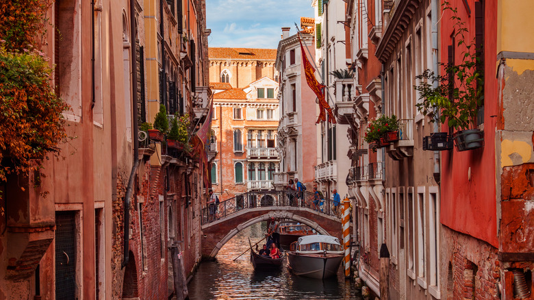 a gondola under a bridge in Venice