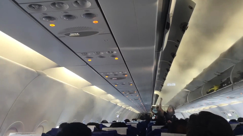 fog filling airplane cabin