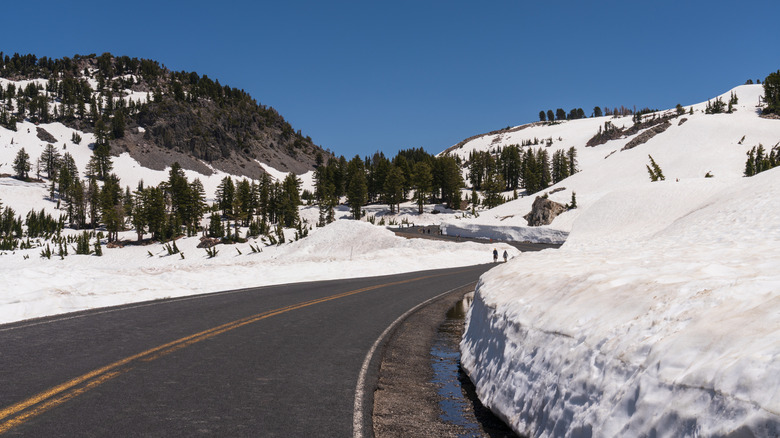 Peak highway with deep snow near the road, Lassen Volcanic National Park
