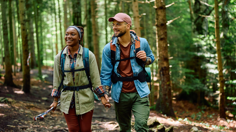 Outdoorsy couple in the forest
