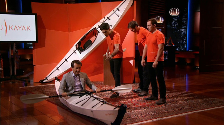 Robert Herjavec sitting in Oru Kayak