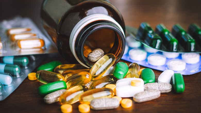 Pill bottle with colorful pills