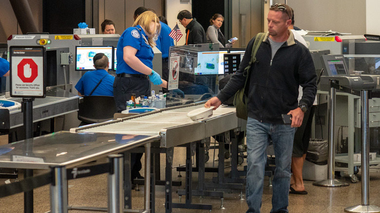 Busy airport security checkpoint