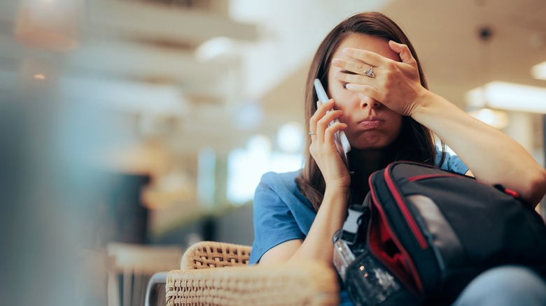 woman stressed on the phone