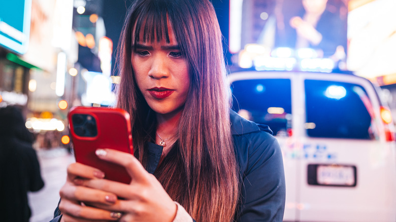 woman on phone times square