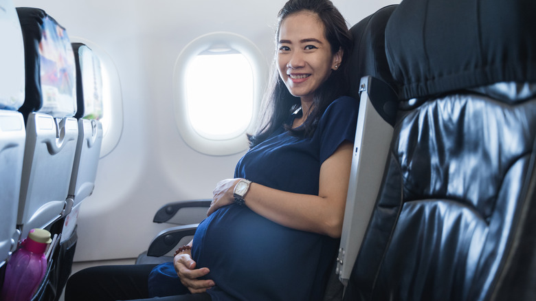 Pregnant woman on plane