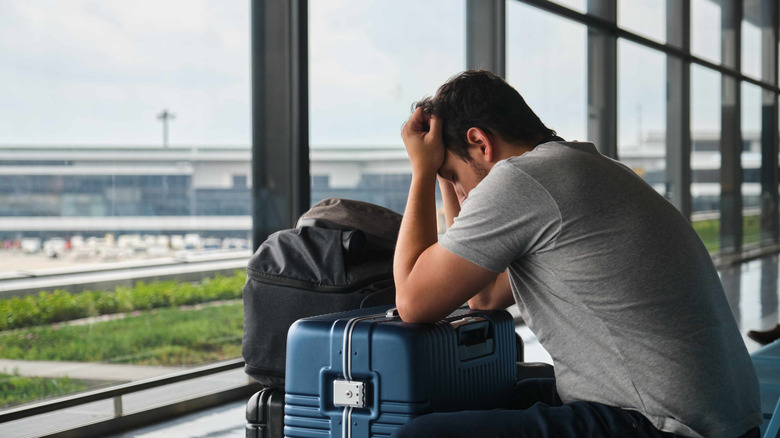 A frustrated man at the airport