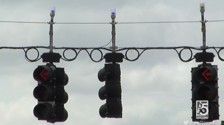 blue beacons above traffic lights in Florida