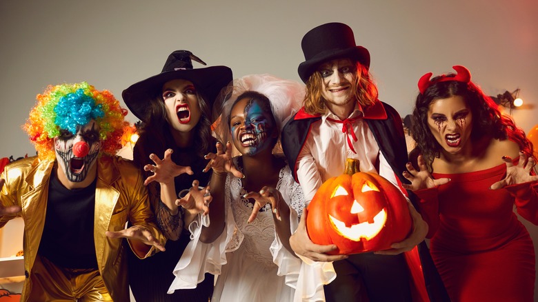 people dressed in halloween costumes