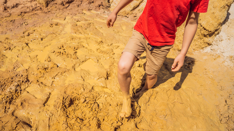Hiker standing in quicksand
