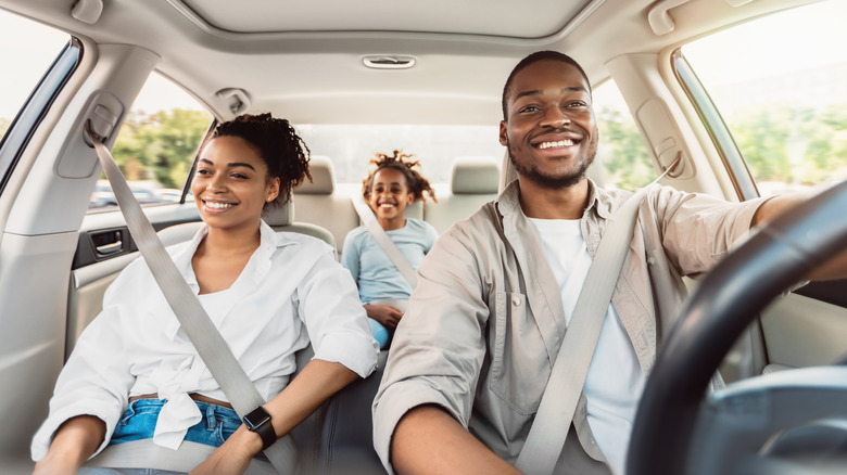 African-American family driving 