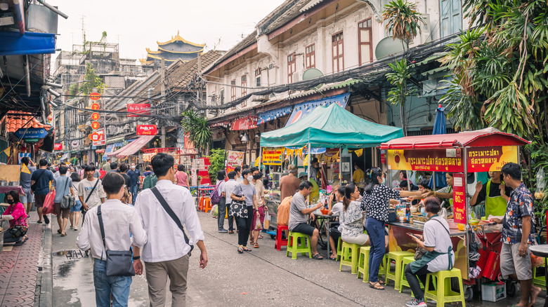 people at night market in Thailand