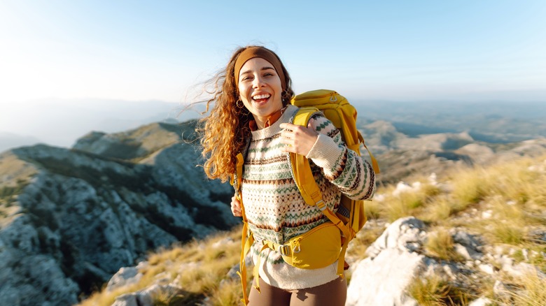 woman with backpack hiking