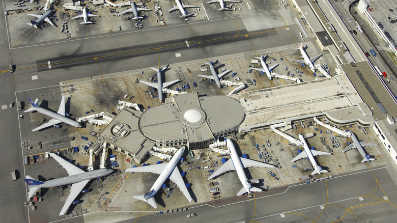 An overhead view of planes parked at LAX.