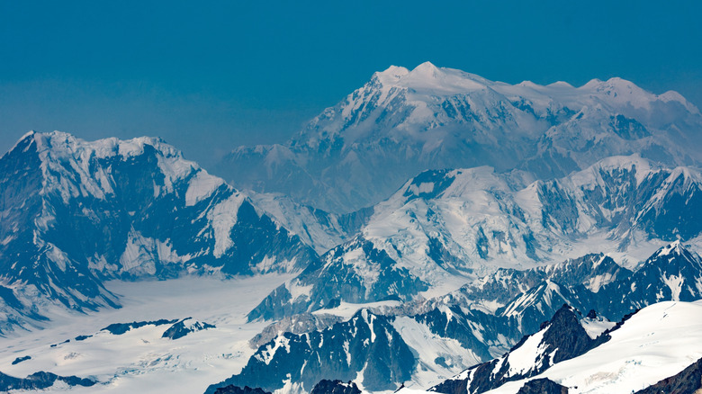 craggy snowy peaks against blue sky