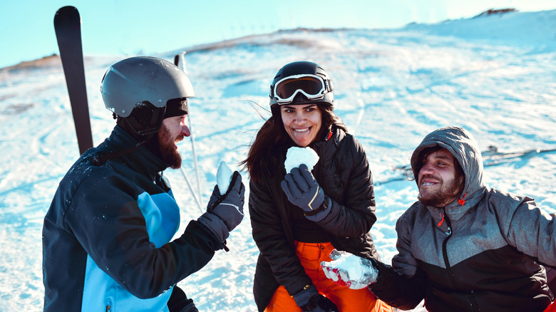 skiers eating snow