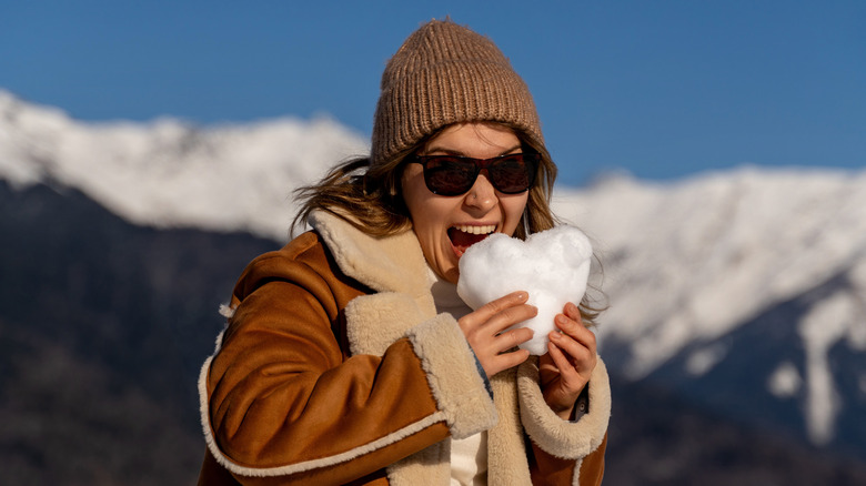 woman eating snow ball