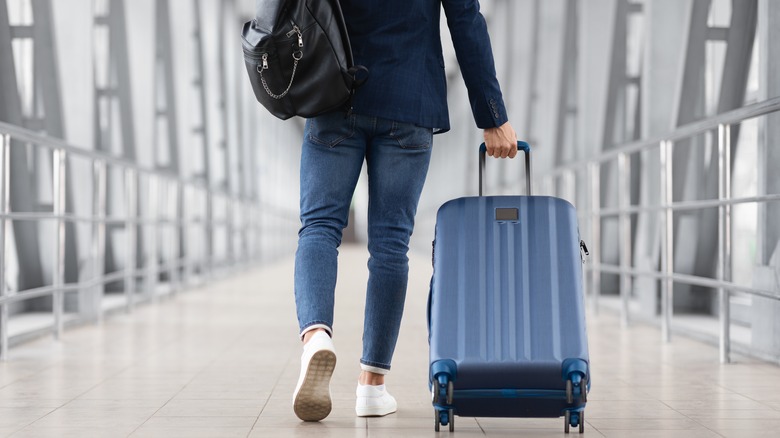 person walking in airport
