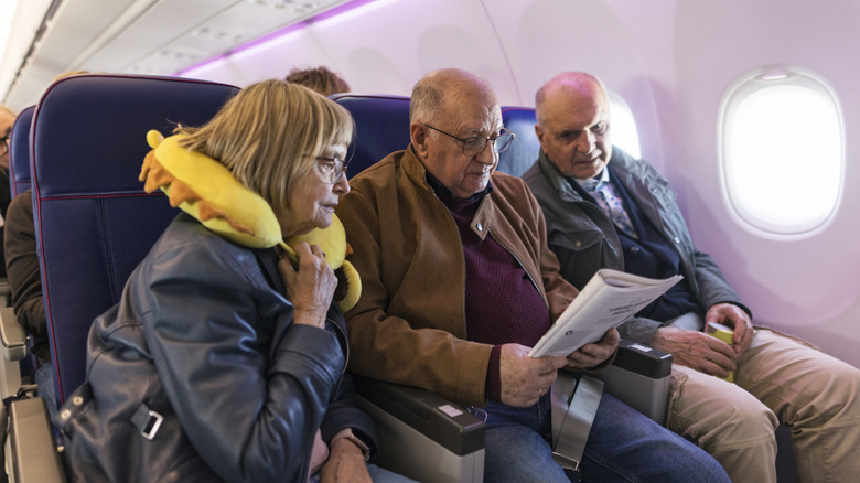 elderly passengers on plane