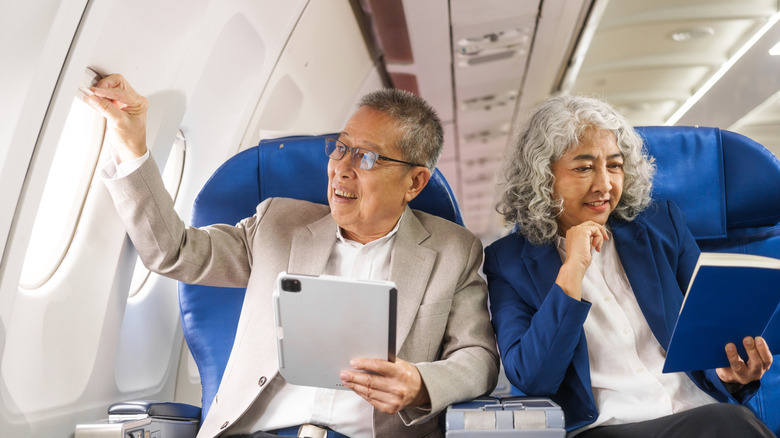 elderly couple on flight