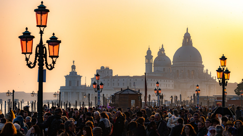 Crowds of people in UNESCO World Heritage Site Venice, Italy